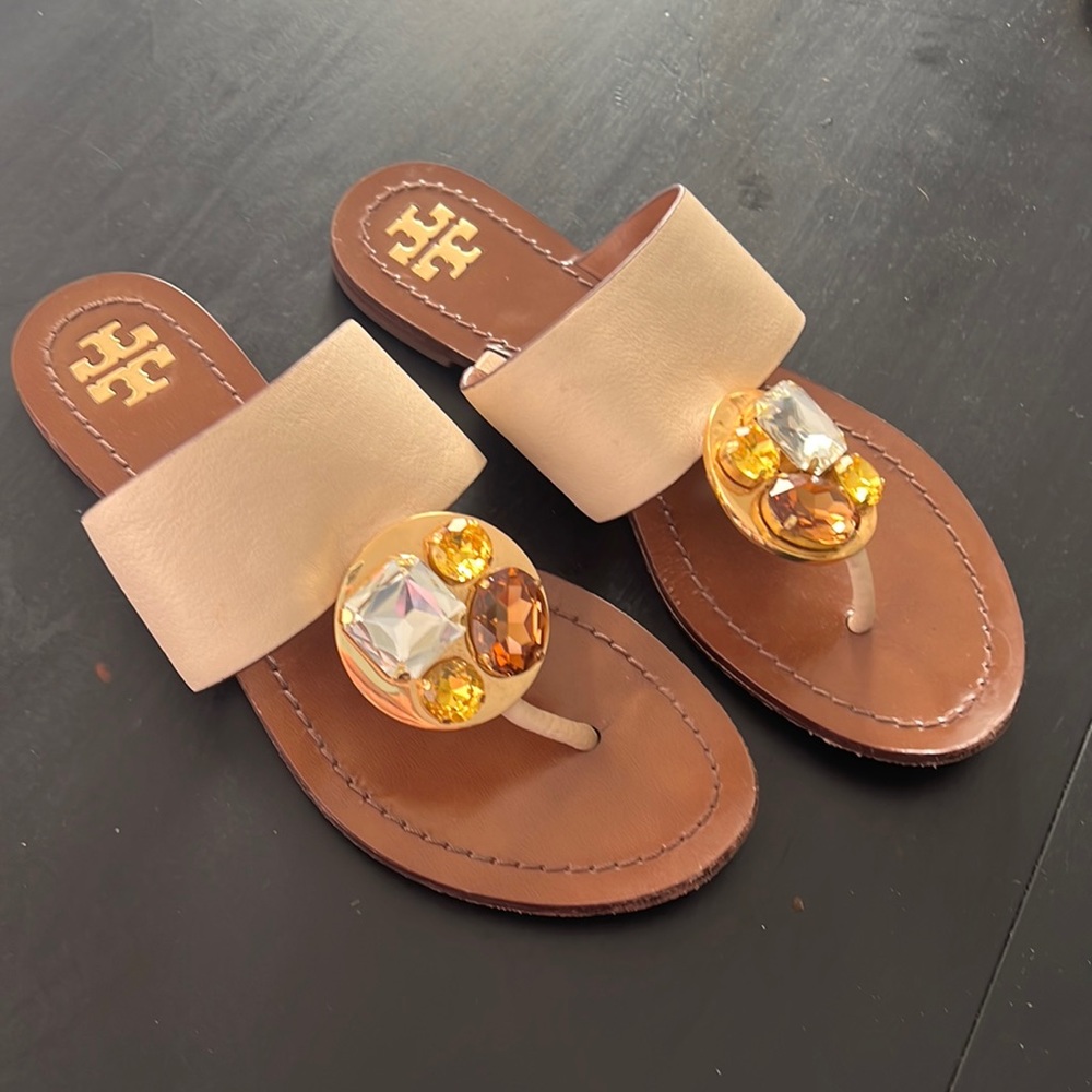 Tory Burch sandal in nude with jewel accent.